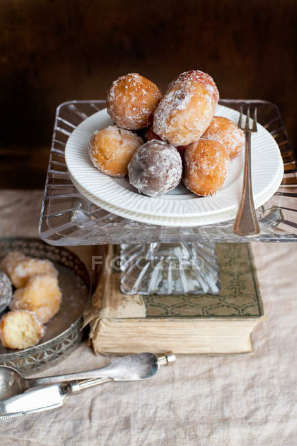 Ornate plates of desserts on cake stand — Stock Photo