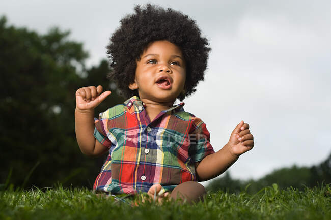 Baby in a park — Stock Photo