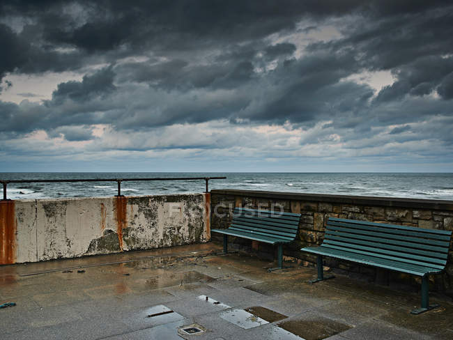 Two benches on end of pier — Stock Photo