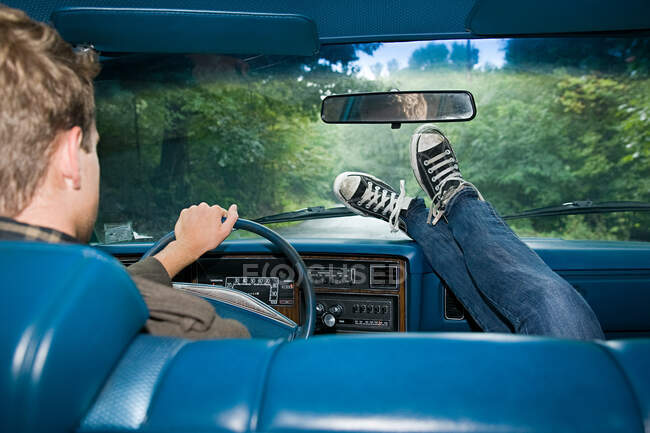 Young people in car — Stock Photo