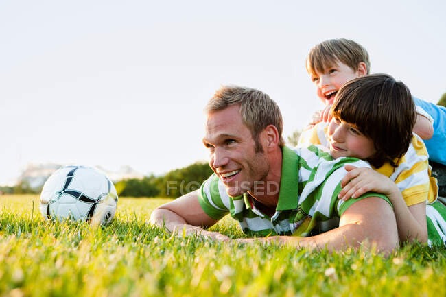 Father And Sons Building Human Pyramid — Stock Photo