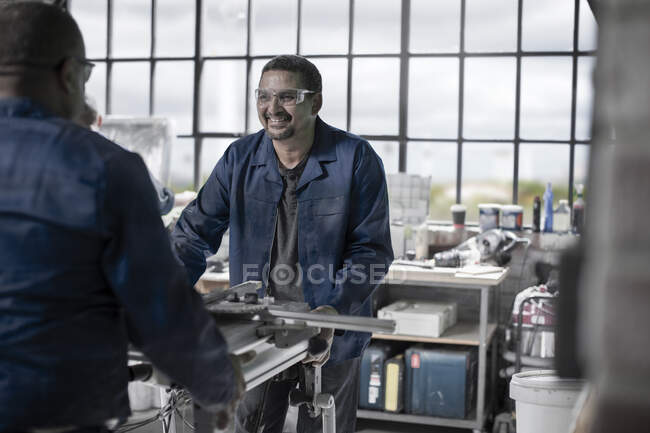 Cape Town, South Africa, two machinists in workshop — Stock Photo