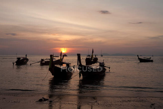 Fishing boats in backlit — Stock Photo