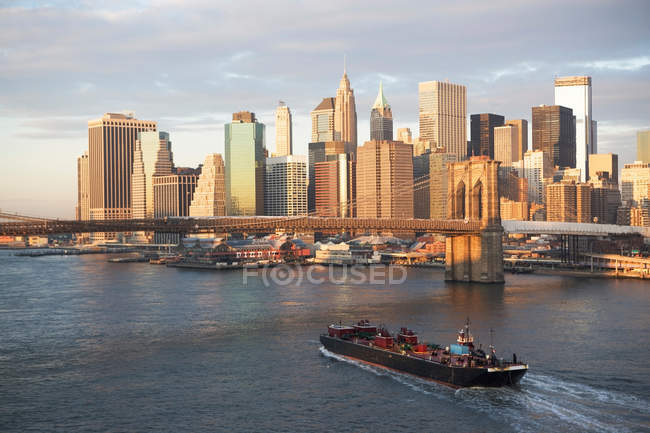 Skyscrapers with ship in harbour — Stock Photo