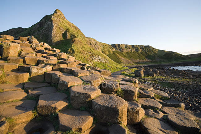 Giants causeway with cloudless sky on background, Ireland — Stock Photo
