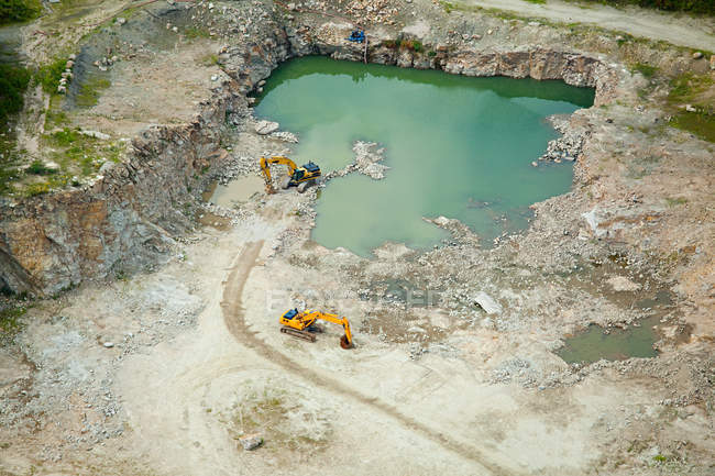 Two diggers in quarry — Stock Photo