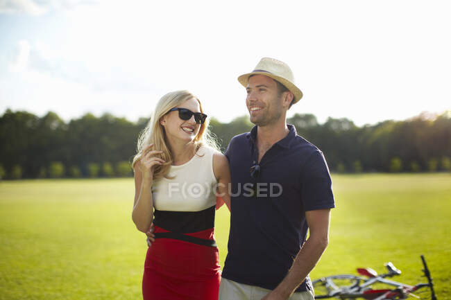 Couple strolling in park — Stock Photo