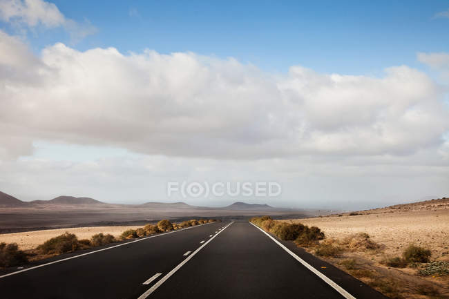 Road through Montanas del fuego — стокове фото