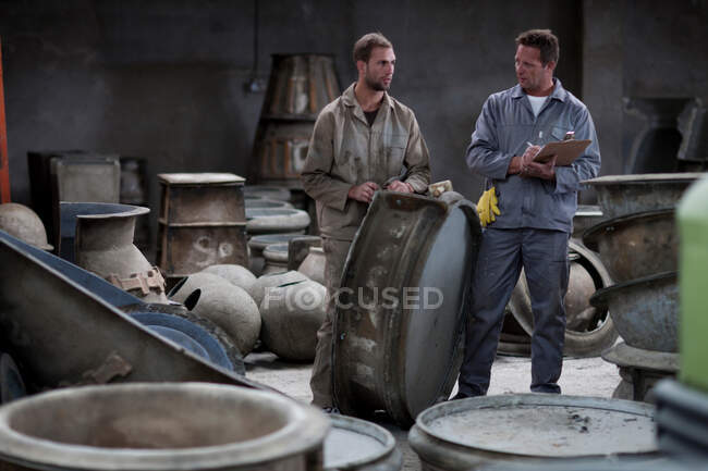 Fetching potters wheel at pottery factory — Stock Photo