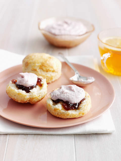 Biscuits served with jam and cheese — Stock Photo