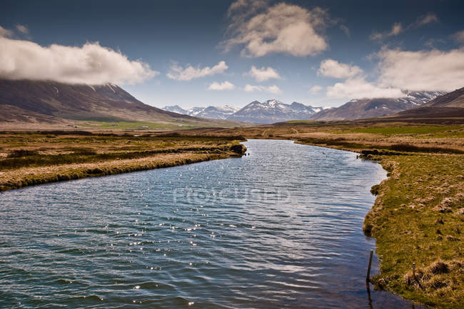 Fljotaa river and mountains on horizon — Stock Photo