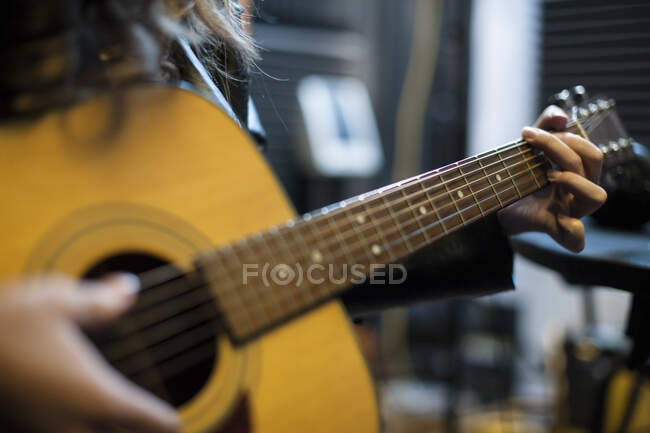 Cape Town, South Africa person with guitar in recording studio — Stock Photo