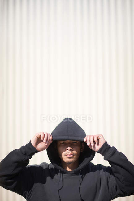 Portrait of a man wearing a hooded top — Stock Photo
