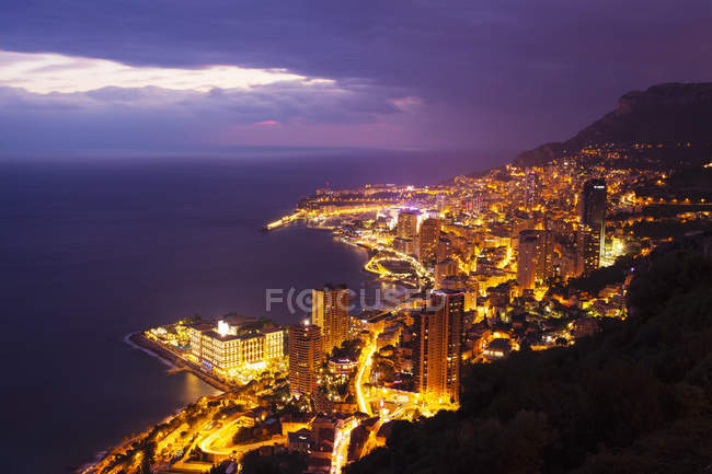 High angle view of Monte Carlo city lights at night, Monaco — Stock Photo