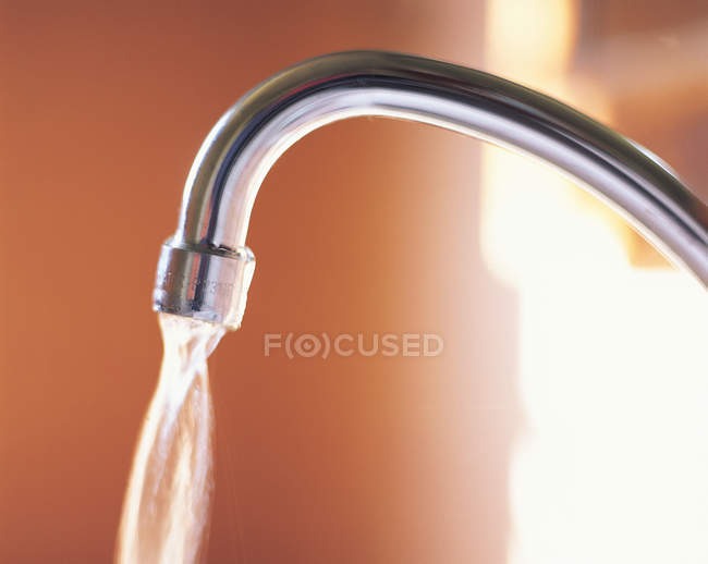 Close up of Running tap in motion — Stock Photo