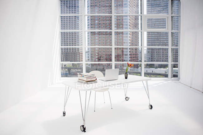 Interior view of sparse white office — Stock Photo