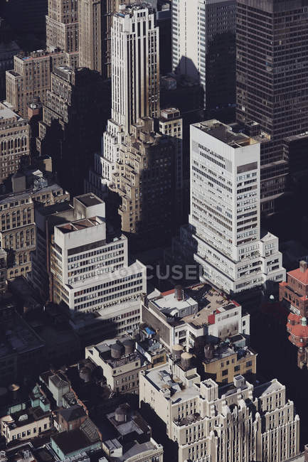 Aerial view of modern skyscrapers in bright sunlight — Stock Photo