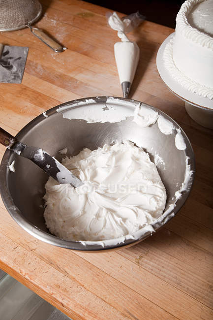 Icing in mixing bowl — Stock Photo