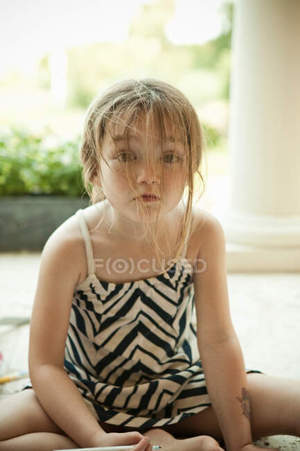 Girl?s hair hanging over face — Stock Photo