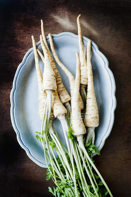 Top view of organic parsley roots — Stock Photo