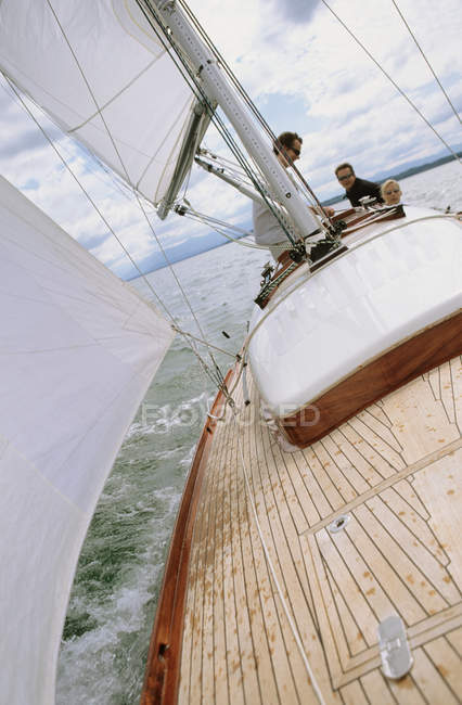 Group of friends on a boat — Stock Photo