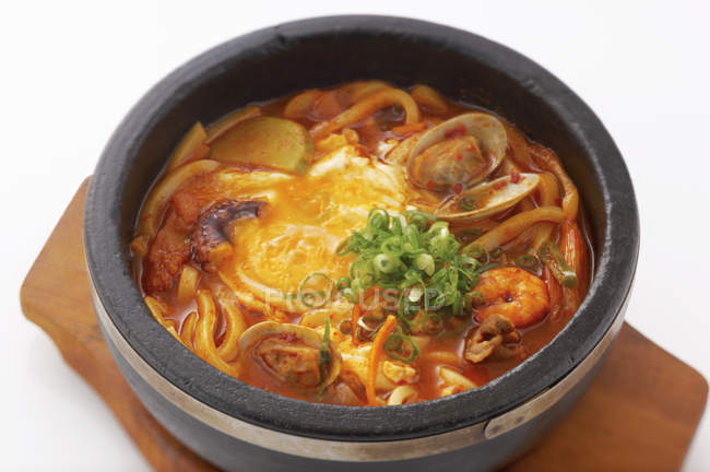 Korean dish of seafood in hotpot, close up shot — Stock Photo