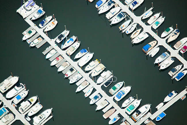 Boats moored at jetty — Stock Photo