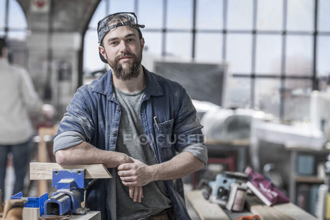 Cape Town, South Africa, Machinist looking confident in workshop — Stock Photo