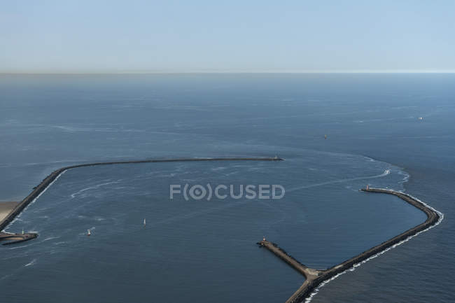 Aerial shot of the breakwaters protecting IJmuiden harbour, IJmuiden, North Holland, Netherlands — Stock Photo