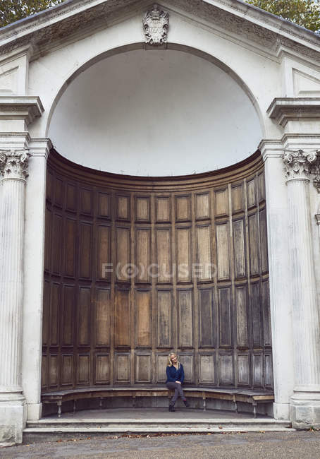 Portrait Of Mid Adult Woman Sitting On Bench At Queen Ann S Alcove