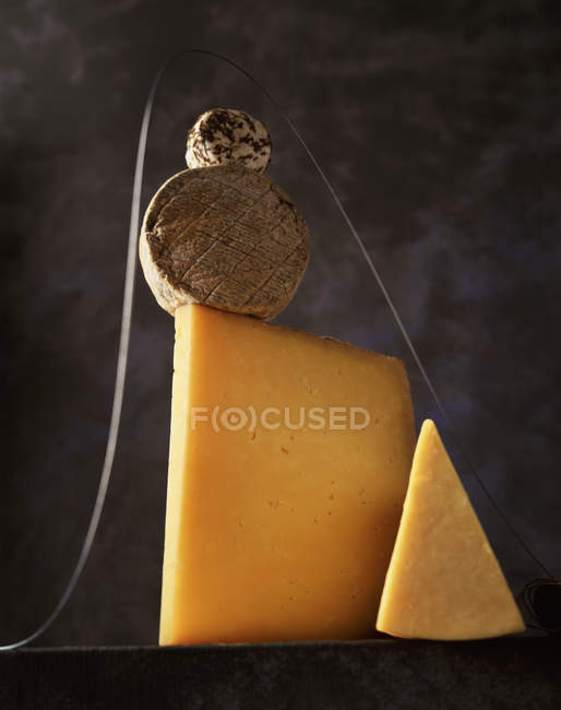 Close up shot of stack of British cheeses — Stock Photo