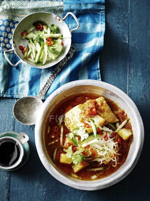 Top view of mace smorlkang, fish stew with salad and soy sauce — Stock Photo