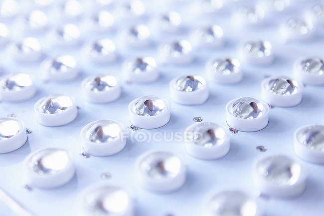 LED bulbs in factory, close up — Stock Photo