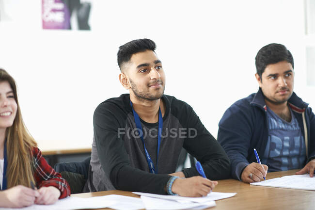 Students studying in classroom — Stock Photo