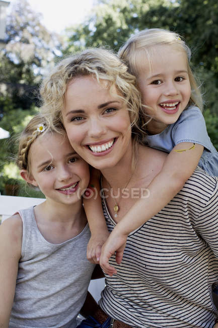 Portrait of mother and daughters — Stock Photo