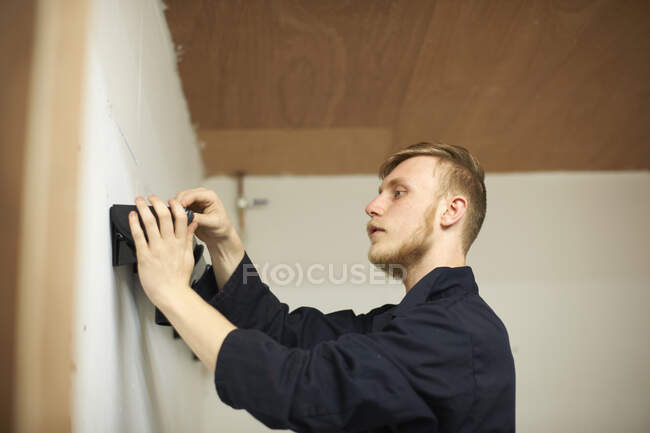Student learning how to do building work — Stock Photo