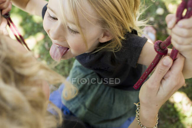 Girl sticking tongue out — Stock Photo