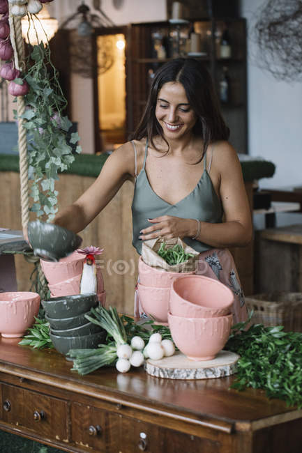 Woman working in restaurant — Stock Photo