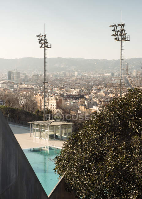 Elevated cityscape with swimming pool, Barcelona, Spain — Stock Photo