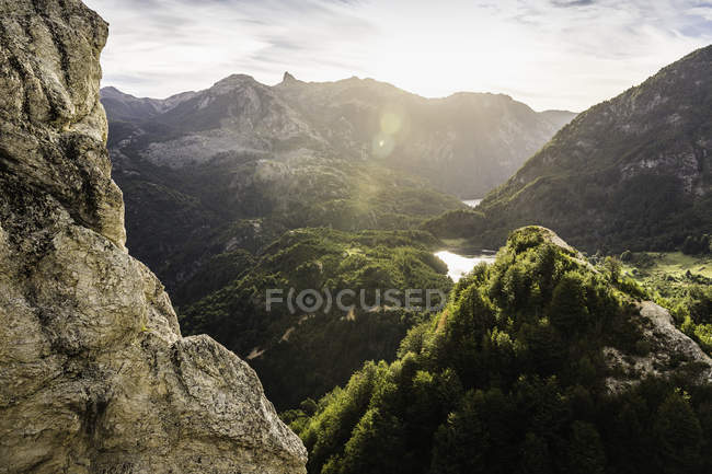 Sunlit mountain valley landscape and rock formations,  Futaleufu, Los Lagos region, Chile — Stock Photo
