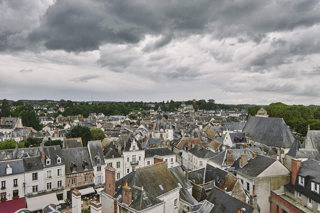 High angle cityscape of traditional townhouses and rooftops, Amboise, Loire Valley, France — Stock Photo