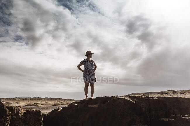 Woman standing on rocks, looking at view, Santa Cruz de Tenerife, Canary Islands, Spain, Europe — Stock Photo
