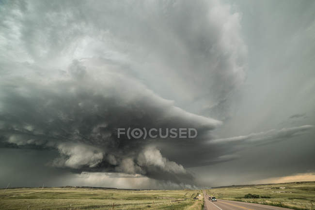 Supercell structure and a lightning, igniting grass fire, Carr, northern Colorado, USA — Stock Photo