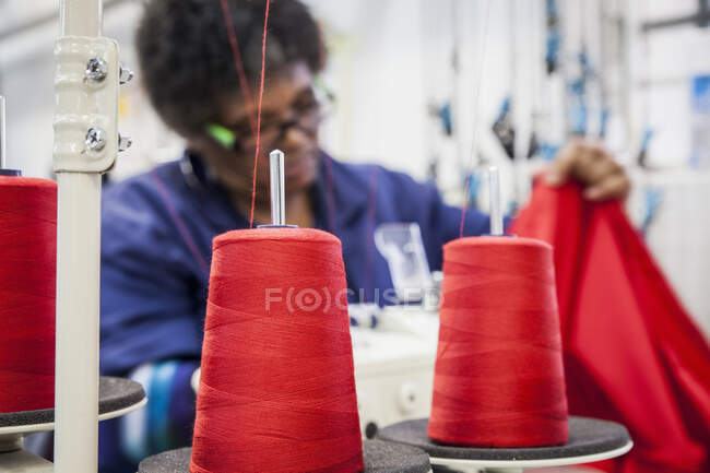 Seamstress working on overlocker in factory, Cape Town, South Africa — Stock Photo