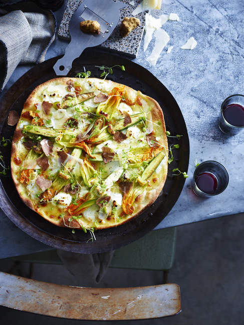Overhead view of tasty Soho house pizza on plate — Stock Photo