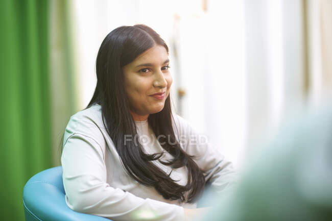 Young female college student in TV studio — Stock Photo