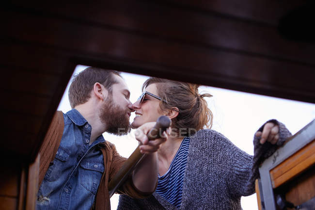 Couple steering canal boat — Stock Photo