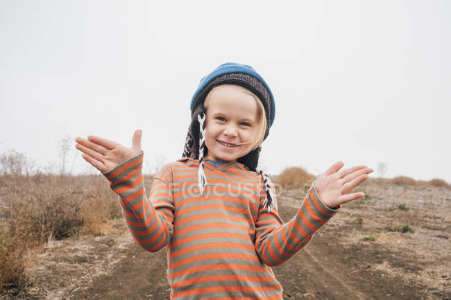 Portrait of boy standing in rural setting — Stock Photo