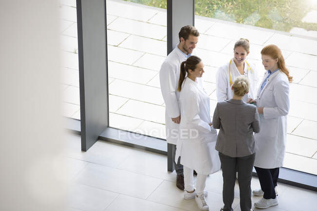 Group of doctors having discussion, elevated view — Stock Photo