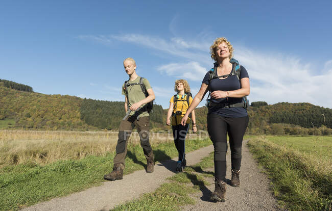 Family hiking together, Meerfeld, Rheinland-Pfalz, Germany — Stock Photo
